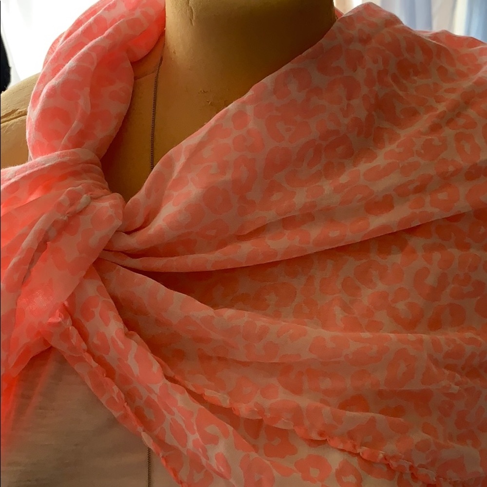 Pink and white cheetah print scarf